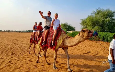 Camel Ride Safari in Red Dunes
