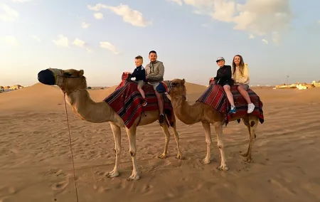 Morning Red Dune Safari with Camel Trekking and sand boarding