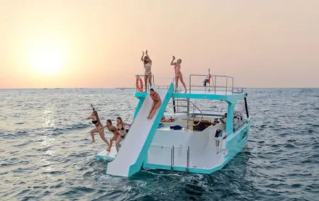 Slide, Cruise & Party on JUMP Private Yacht with BBQ & Drinks