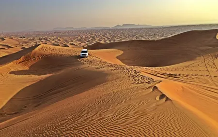 Premium Camp Red Dune Desert Safari Camel Ride and Sandboarding