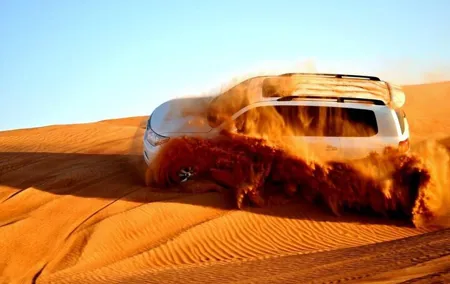 Morning Desert Safari with Sandboard and Camel Ride