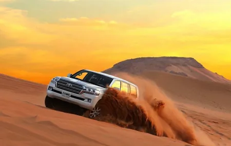 Desert Safari 4x4 Drive With Camel Ride,Belly DanceTanura & Fire Show BBQ Dinner