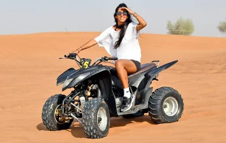 Desert Safari With 30 Mins Of Quad Bike Tour Camel Ride And BBQ