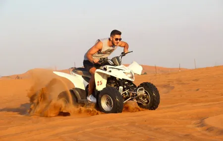 Red Dune Bashing with Quad Bike Sandboard Camel Ride & BBQ Dinner