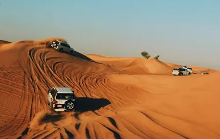 Dubai Desert Safari with Camel Ride, Sandboarding & Live Shows