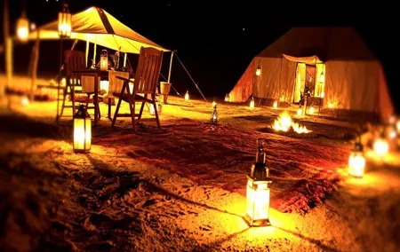 Overnight Desert Safari with Dune Bashing, Belly Dance, Camel Ride and Breakfast