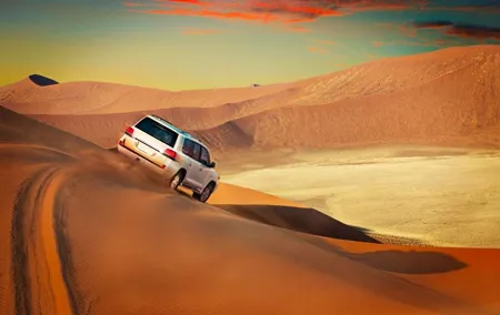 Dubai Desert Safari Red Dune: BBQ, Camel Ride & Sand-boarding