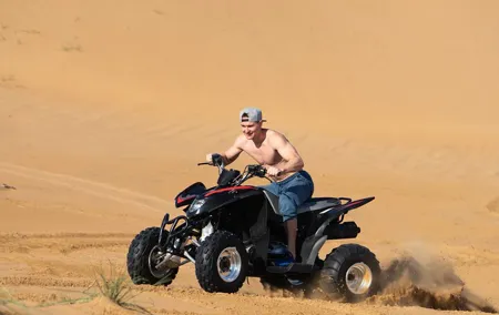 Desert Safari Quad Bike and Camel Experience with BBQ Dinner