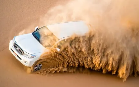 Dubai Evening Desert Quad Bike Adventure and BBQ Dinner