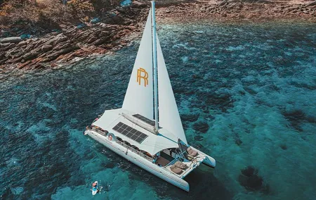 Rhapsody Phuket Coral & Racha Sunset Catamaran Cruise