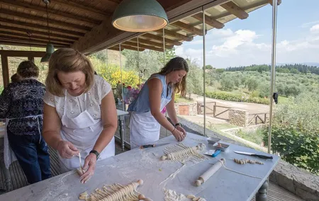 Cooking Class and Lunch at a Tuscan Farmhouse with Local Market Tour from Florence