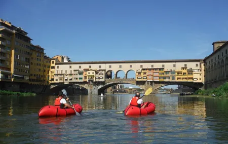 Kayaking on the Arno River in Florence under the Pontevecchio Arcade