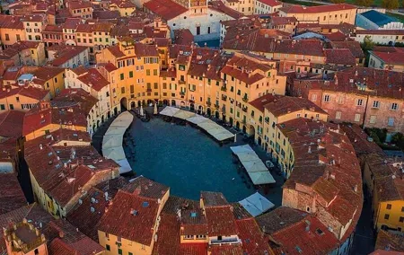 Discover Lucca and Pisa and Enjoy Buccellato Cake: Full Day Tour