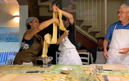 Traditional pasta rolling in an ancient Tuscan home