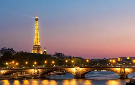 Paris By Night with Seine River Cruise and Roundtrip Luxury Transportation