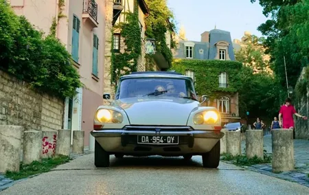 The Essentials of Paris in a Classic Open Top Car Citroën DS