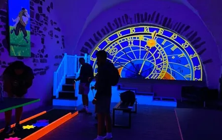 Prague Black Light Mini Golf and Games Tour Including Free Drinks