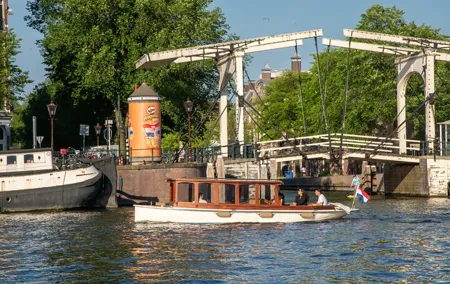 Private Boat Tour Amsterdam - 90 Min incl. welcome drink on historic saloon boat