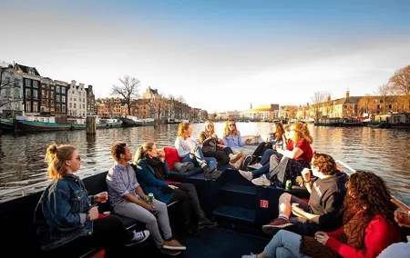Amsterdam Sunset Canal Cruise with Live Guide and Open Bar