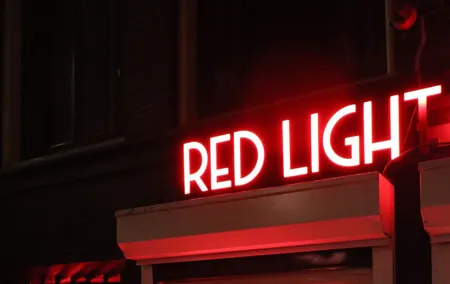 Private red light district & coffeeshop tour with a local