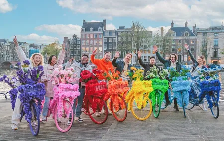 Explore Amsterdam canals on iconic Flower Bikes
