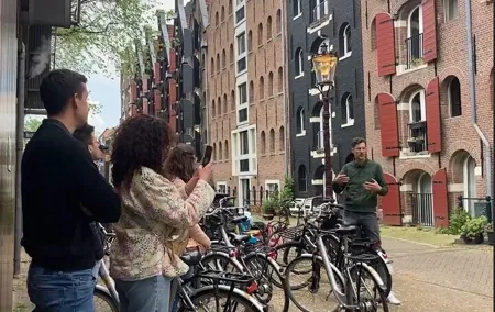 Explore Amsterdam by Bike in the Company of a French Local Guide