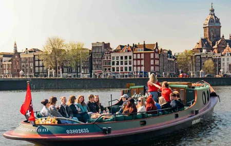 Amsterdam Classic Canal Cruise on a Historic Tugboat