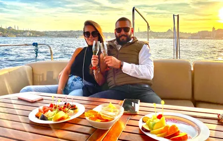 Bosphorus Sunset or Daytime Yacht Cruise with Snacks & Live Guide