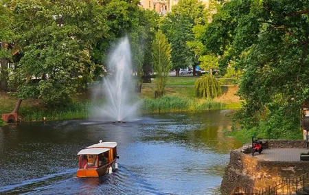 Riga Canal and Daugava Boat Tour with Welcome Drink & Audio Guide