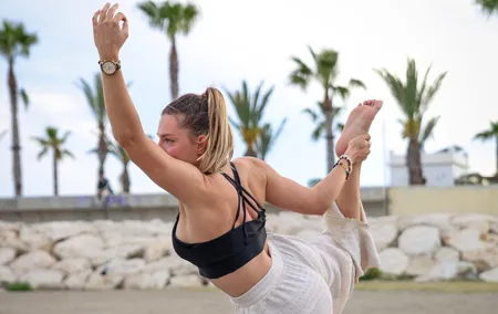 Holistic Sunset Beach Yoga Experience in Malaga with Maria