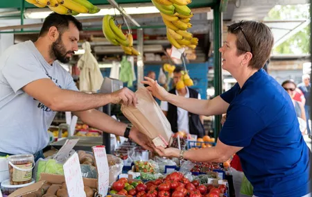 Market visit and cooking class with lunch or dinner at a local's home in Rapallo