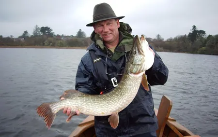 Pike fishing by boat.Lough Corrib,Connemara.English/French speaking Ghillie
