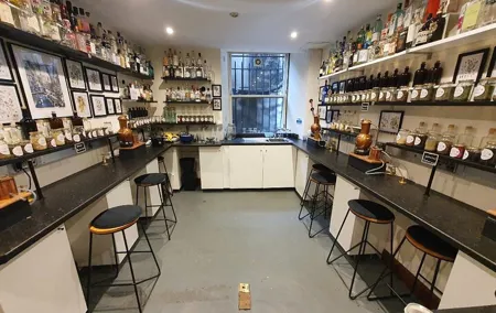 Distill a bottle of gin on mini copper stills