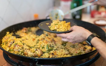 Cook your Paella with Purchase to Russafa Market in Valencia