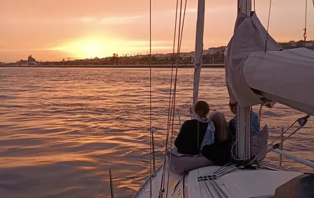 Sunset sailing boat trip in Lisbon with snacks