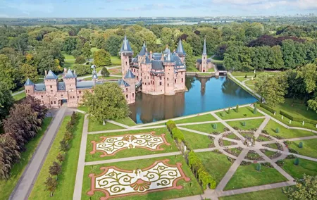 Private transfer: Rotterdam>Amsterdam, 2h Stop in De Haar Castle