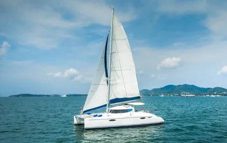 Phuket Catamaran Tour to Coral Island and Sunset Voyage