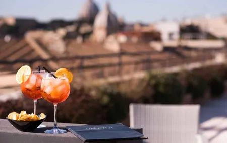 Sunset drinks on the rooftops of Rome