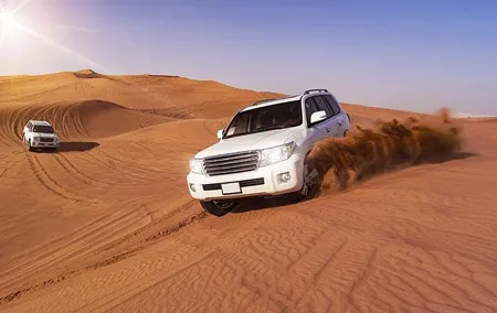 Dubai Evening Desert Safari, Camel Ride, Sandboarding & BBQ Dinner